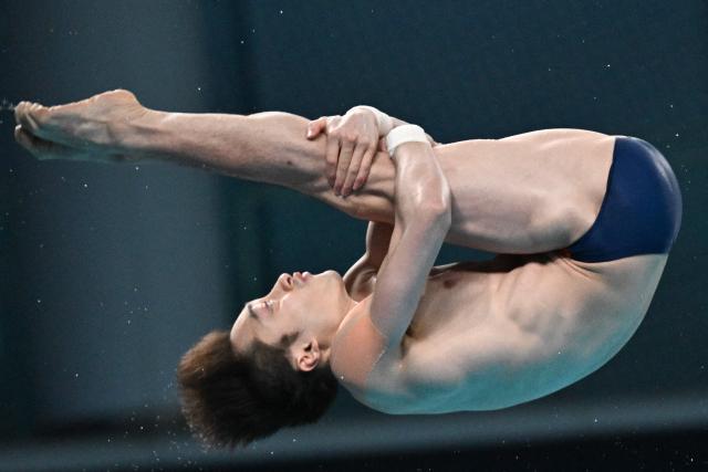 Chinaґs Lian Junjie competes in the men’s 10m platform event at the World Aquatics Diving World Cup Super Finals in Beijing on May 3, 2026. (Photo by Pedro PARDO / AFP)