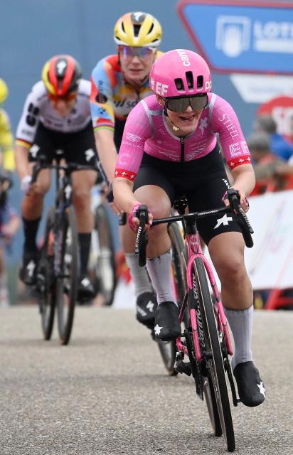 Team EF Education - Cannondale's Swiss rider Noemi Ruegg arrives to the finish in first place followed by Team Boels - Dolmans Cyclingteam's Belgian rider Lotte Kopecky and Team FDJ - SUEZ's German rider Franziska Koch, at the end of the first stage of the 2026 La Vuelta Femenina cycling tour of Spain, a 113.9 km race between Marin and Salvaterra do Mino, on May 3, 2026. (Photo by Miguel RIOPA / AFP)