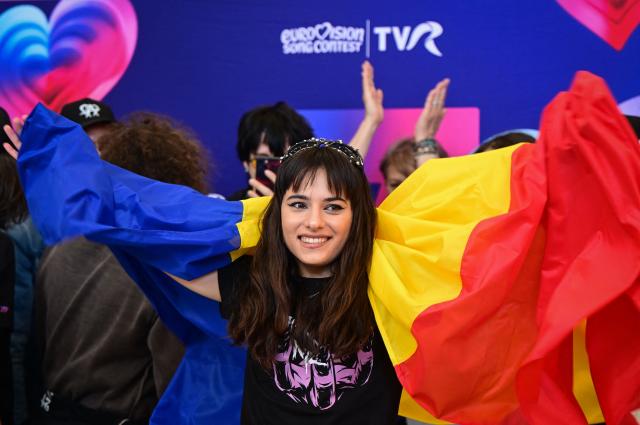 Romanian singer Alexandra Capitanescu, the country’s representative at the Eurovision Song Contest 2026, poses at Henri Coanda International Airport in Otopeni, near Bucharest on May 3, 2026, before departing for Vienna, the host city of the Eurovision Song Contest 2026. (Photo by Daniel MIHAILESCU / AFP)