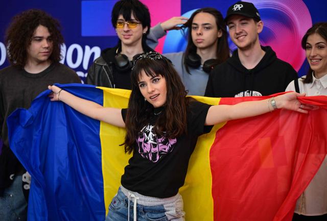 Romanian singer Alexandra Capitanescu, the country’s representative at the Eurovision Song Contest 2026, poses at Henri Coanda International Airport in Otopeni, near Bucharest on May 3, 2026, before departing for Vienna, the host city of the Eurovision Song Contest 2026. (Photo by Daniel MIHAILESCU / AFP)