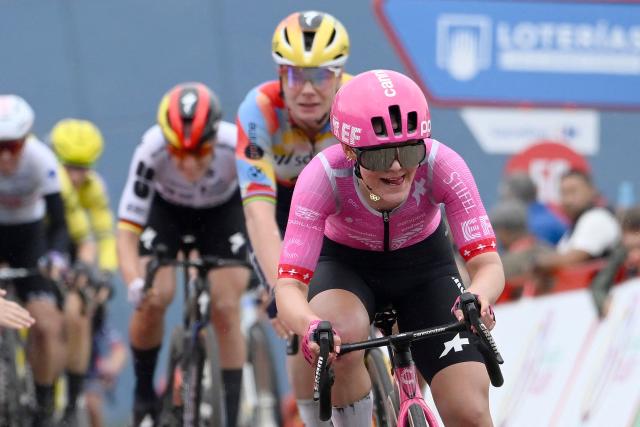 Team EF Education - Cannondale's Swiss rider Noemi Ruegg arrives at the finish in first place followed by Team Boels - Dolmans Cyclingteam's Belgian rider Lotte Kopecky and Team FDJ - SUEZ's German rider Franziska Koch, at the end of the first stage of the 2026 La Vuelta Femenina cycling tour of Spain, a 113.9 km race between Marin and Salvaterra do Mino, on May 3, 2026. (Photo by Miguel RIOPA / AFP)