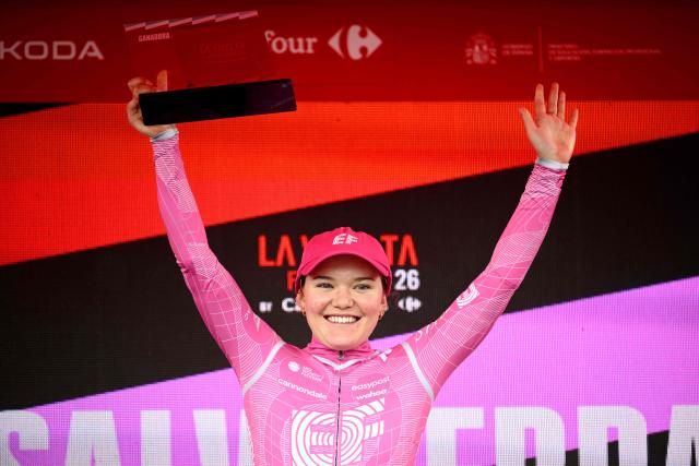 Team EF Education - Cannondale's Swiss rider Noemi Ruegg celebrates on the podium after winning the first stage of the 2026 La Vuelta Femenina cycling tour of Spain, a 113.9 km race between Marin and Salvaterra do Mino, on May 3, 2026. (Photo by Miguel RIOPA / AFP)