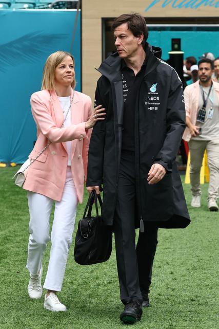 Mercedes' Austrian team principal and CEO Toto Wolff (R) and Managing Director of the F1 Academy Susie Wolff (L) arrive ahead of the 2026 Miami Formula One Grand Prix at Miami International Autodrome in Miami Gardens, Florida, on May 3, 2026. (Photo by CHARLY TRIBALLEAU / AFP)