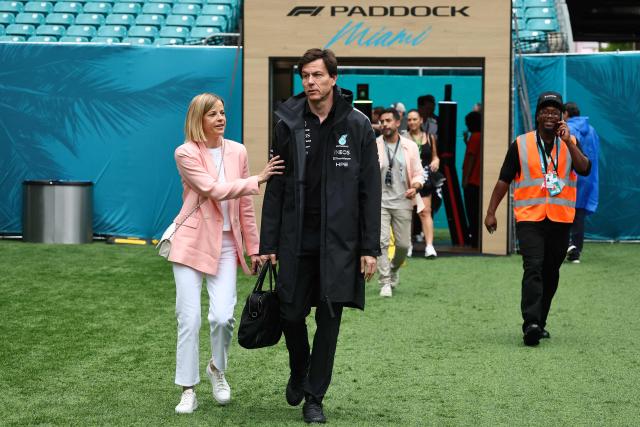Mercedes' Austrian team principal and CEO Toto Wolff (R) and Managing Director of the F1 Academy Susie Wolff (L) arrive ahead of the 2026 Miami Formula One Grand Prix at Miami International Autodrome in Miami Gardens, Florida, on May 3, 2026. (Photo by CHARLY TRIBALLEAU / AFP)