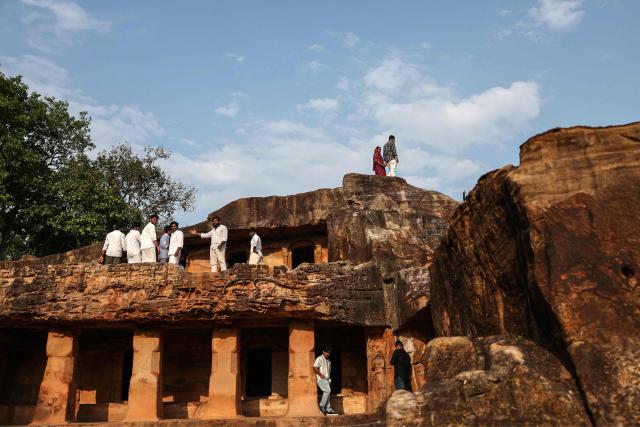 People visit the Udayagiri and Khandagiri Caves in Bhubaneswar on May 3, 2026. (Photo by Niharika KULKARNI / AFP)