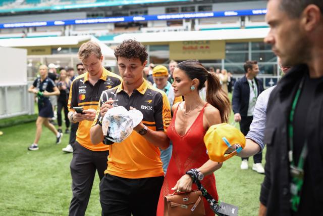 McLaren's British driver Lando Norris signs an autograph in the paddock ahead of the 2026 Miami Formula One Grand Prix at Miami International Autodrome in Miami Gardens, Florida, on May 3, 2026. (Photo by CHARLY TRIBALLEAU / AFP)