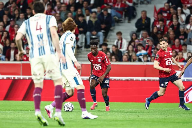 Lille's Portuguese forward #27 Felix Correia (C) prepares to strike the ball during the French L1 football match between Lille LOSC and Le Havre AC at the Pierre Mauroy stadium in Villeneuve-d'Ascq, northern France, on May 3, 2026. (Photo by Sameer Al-DOUMY / AFP)