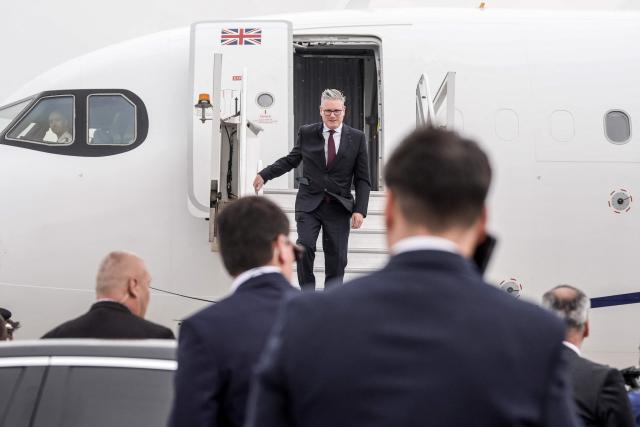 Britain's Prime Minister Keir Starmer disembarks from an airplane upon arrival to the airport ahead of attending the 8th European Political Community (EPC) summit in Yerevan on May 3, 2026. (Photo by Stefan Rousseau / POOL / AFP)