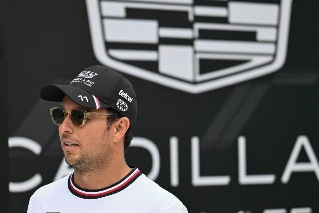 Cadillac's Mexican driver Sergio Perez arrives for the Driver's Parade before the 2026 Miami Formula One Grand Prix at Miami International Autodrome in Miami Gardens, Florida, on May 3, 2026. (Photo by CHANDAN KHANNA / AFP)