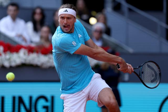 Germany's Alexander Zverev returns a ball to Italy's Jannik Sinner during the 2026 ATP Tour Madrid Open tennis tournament final singles match at the Caja Magica in Madrid, on May 3, 2026. (Photo by Thomas COEX / AFP)