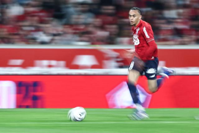 Lille's French midfielder #08 Ethan Mbappe runs with the ball during the French L1 football match between Lille LOSC and Le Havre AC at the Pierre Mauroy stadium in Villeneuve-d'Ascq, northern France, on May 3, 2026. (Photo by Sameer Al-DOUMY / AFP)