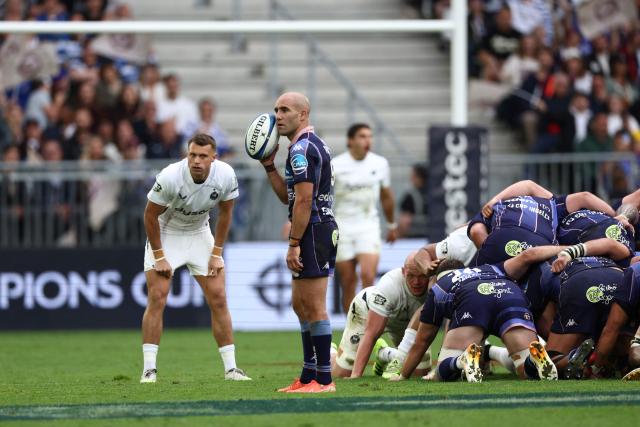 Bordeaux-Begles' French scrum-half Maxime Lucu (2nd L) hold the ball during the European Champions Cup semi-final rugby union match between Union Bordeaux Belges (UBB) and Bath Rugby at the Atlantique Bordeaux Metropole Stadium in Bordeaux, southwestern France, on May 3, 2026. (Photo by ROMAIN PERROCHEAU / AFP)
