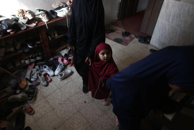 Some of the 470 Palestinian girls and young women arrive to attend a Quran recitation circle at the Al-Nour Quran Memorization Center following a long hiatus due to the war between the Israeli military and Palestinian Hamas militants, in Khan Yunis in the southern Gaza Strip on May 3, 2026. The Quran recitation study circle gathers the faithful around a teacher or a shared text for the purpose of learning, recitation, discussion, or spiritual development. The war on the Gaza Strip was sparked following the militant Palestinian group Hamas's October 7, 2023 attack on Israel, which resulted in the deaths of 1,221 people. Israel's retaliatory assault on Gaza has killed at least 72,600 people, according to figures from the health ministry that the UN considers reliable, with the majority of Gaza's 2.4 million people being displaced. (Photo by Bashar Taleb / AFP)