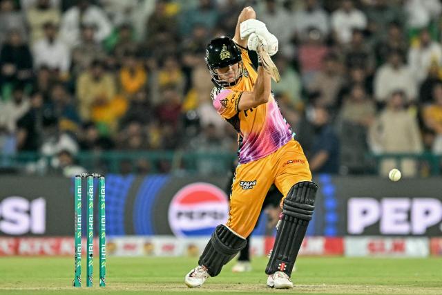 Peshawar Zalmi's Australian cricket player Aaron Hardie plays a shot during the Pakistan Super League (PSL) Twenty20 final match between Hyderabad Kingsmen and Peshawar Zalmi at the Gaddafi Stadium in Lahore on May 3, 2026. (Photo by Arif ALI / AFP)