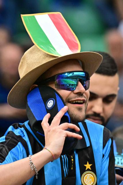 Inter Milan's supporters wait for the start of the Italian Serie A football match between Inter Milan and Parma at San Siro stadium in Milan, on May 3, 2026. (Photo by Stefano RELLANDINI / AFP)