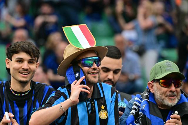 Inter Milan's supporters wait for the start of the Italian Serie A football match between Inter Milan and Parma at San Siro stadium in Milan, on May 3, 2026. (Photo by Stefano RELLANDINI / AFP)