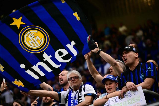Inter Milan's supporters cheer before the Italian Serie A football match between Inter Milan and Parma at San Siro stadium in Milan, on May 3, 2026. (Photo by Marco BERTORELLO / AFP)