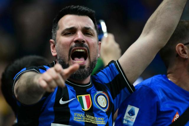 Inter Milan's supporters cheer before the start of the Italian Serie A football match between Inter Milan and Parma at San Siro stadium in Milan, on May 3, 2026. (Photo by Stefano RELLANDINI / AFP)