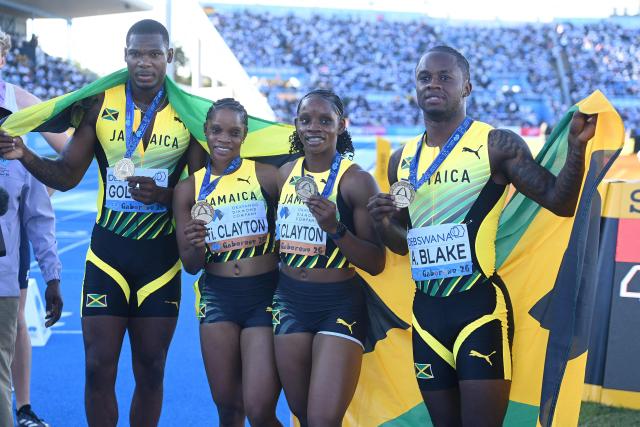 (From L to R) Jamaica's Kadrian Goldson, Tina Clayton, Tia Clayton and Kadrian Goldson celebrate after winning the mixed 4x100m relay final during the Gaborone 26 World Athletics Relays at the National Stadium in Gaborone on May 3, 2026. (Photo by AFP)