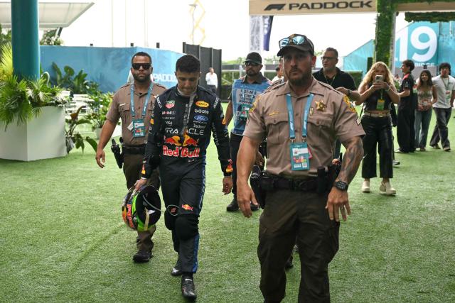 Red Bull Racing's French driver Isack Hadjar departs after being knocked out of the race in an accident during the 2026 Miami Formula One Grand Prix at Miami International Autodrome in Miami Gardens, Florida, on May 3, 2026. (Photo by CHANDAN KHANNA / AFP)