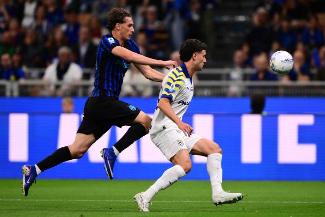 Inter Milan's Italian forward #94 Pio Esposito fights for the ball with Parma's Argentinian defender #37 Mariano Troilo during the Italian Serie A football match between Inter Milan and Parma at San Siro stadium in Milan, on May 3, 2026. (Photo by Marco BERTORELLO / AFP)