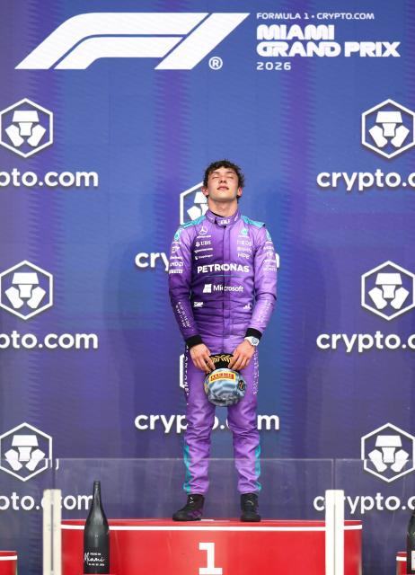 Race winner Mercedes' Italian driver Kimi Antonelli stands on the podium after the 2026 Miami Formula One Grand Prix at Miami International Autodrome in Miami Gardens, Florida, on May 3, 2026. (Photo by CHARLY TRIBALLEAU / AFP)