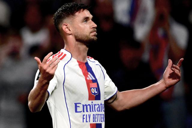 Lyon's Ukrainian forward #77 Roman Yaremchuk celebrates scoring his team's first goal during the French L1 football match between Olympique Lyonnais (OL) and Stade Rennais FC at the Groupama Stadium in Decines-Charpieu, central-eastern France on May 3, 2026. (Photo by OLIVIER CHASSIGNOLE / AFP)