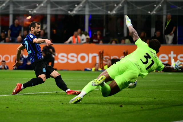 Inter Milan's Armenian forward #22 Henrikh Mkhitaryan scores his team's second goal during the Italian Serie A football match between Inter Milan and Parma at San Siro stadium in Milan, on May 3, 2026. (Photo by Marco BERTORELLO / AFP)