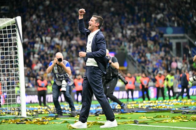 Inter Milan's Romanian head coach Cristian Chivu celebrates after winning the 21st 'scudetto' following the Italian Serie A football match between Inter Milan and Parma at San Siro stadium in Milan, on May 3, 2026. (Photo by Stefano RELLANDINI / AFP)