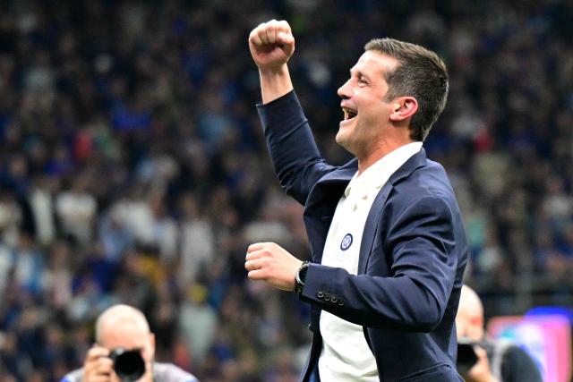 Inter Milan's Romanian head coach Cristian Chivu celebrates after winning the 21st 'scudetto' following the Italian Serie A football match between Inter Milan and Parma at San Siro stadium in Milan, on May 3, 2026. (Photo by Stefano RELLANDINI / AFP)