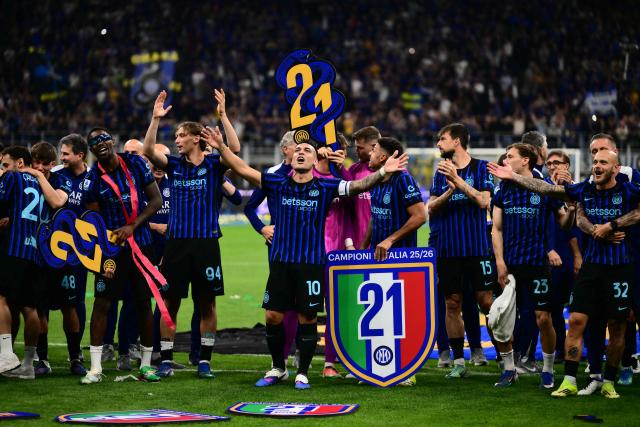 Inter Milan's Argentinian forward #10 Lautaro Martinez celebrates with teammates after winning their 21st 'scudetto' following the Italian Serie A football match between Inter Milan and Parma at San Siro stadium in Milan, on May 3, 2026. (Photo by Marco BERTORELLO / AFP)