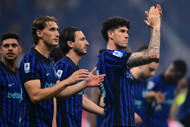 Inter Milan's Italian defender #95 Alessandro Bastoni (R) and Inter Milan's Italian forward #94 Pio Esposito celebrate after winning their 21st 'scudetto' following the Italian Serie A football match between Inter Milan and Parma at San Siro stadium in Milan, on May 3, 2026. (Photo by Marco BERTORELLO / AFP)