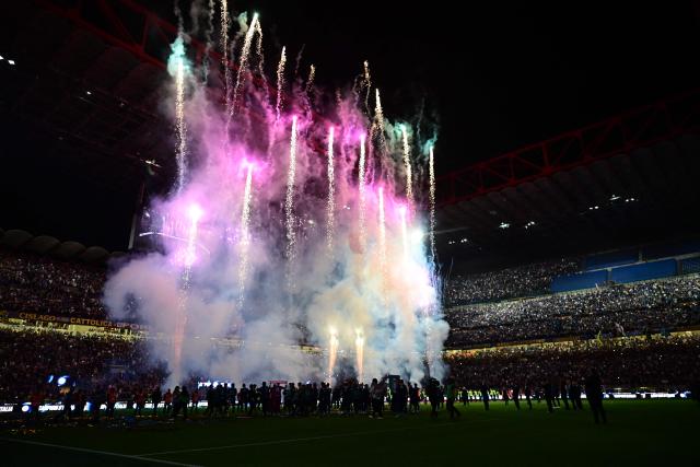 A general view shows fireworks after Inter Milan won their 21st 'scudetto' following the Italian Serie A football match between Inter Milan and Parma at San Siro stadium in Milan, on May 3, 2026. (Photo by Stefano Rellandini / AFP)