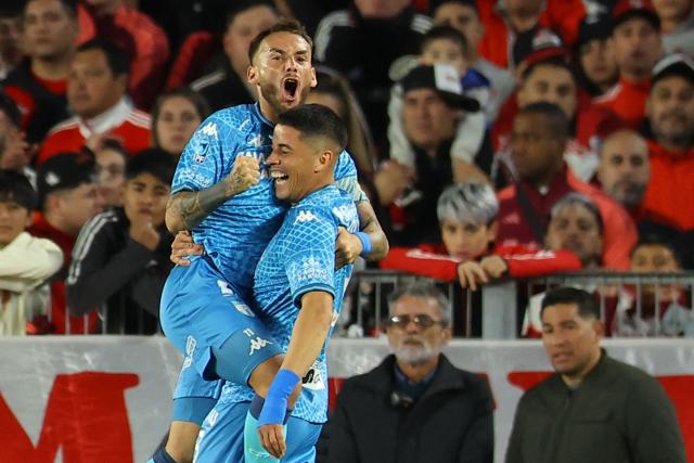 Atletico Tucuman's midfielder #11 Renzo Tesuri (L) celebrates with teammate Uruguayan defender #03 Maximiliano Villa after scoring during the Argentine Professional Football League 2026 Apertura tournament match between River Plate and Atletico Tucuman, at the Mas Monumental stadium in Buenos Aires on May 3, 2026. (Photo by ALEJANDRO PAGNI / AFP)