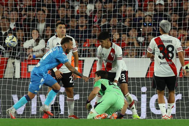 Atletico Tucuman's midfielder #11 Renzo Tesuri (L) celebrates after scoring during the Argentine Professional Football League 2026 Apertura tournament match between River Plate and Atletico Tucuman, at the Mas Monumental stadium in Buenos Aires on May 3, 2026. (Photo by ALEJANDRO PAGNI / AFP)