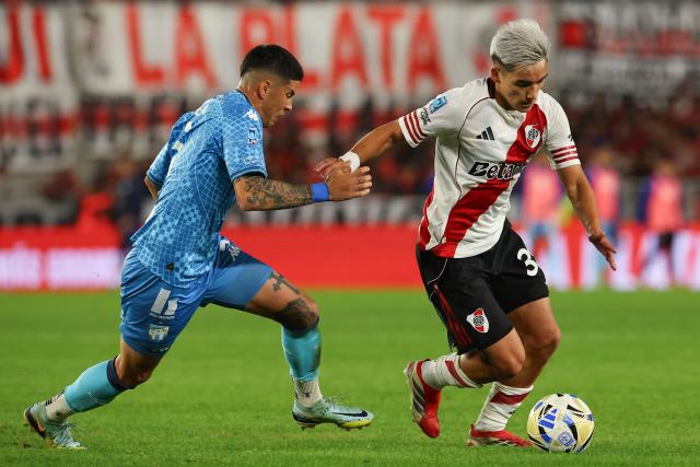 Tucuman’s defender #3 Maximiliano Villa and River Plate's forward #38 Ian Subiabre fight for the ball during the Argentine Professional Football League 2026 Apertura tournament match between River Plate and Atletico Tucuman, at the Mas Monumental stadium in Buenos Aires on May 3, 2026. (Photo by ALEJANDRO PAGNI / AFP)