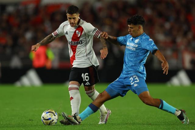 River Plate's defender #16 Fabricio Bustos and Tucuman’s midfielder #23 Nicolas Lamendola fight for the ball during the Argentine Professional Football League 2026 Apertura tournament match between River Plate and Atletico Tucuman, at the Mas Monumental stadium in Buenos Aires on May 3, 2026. (Photo by ALEJANDRO PAGNI / AFP)