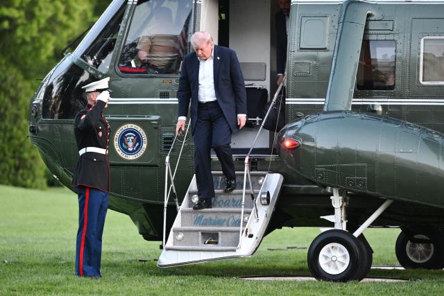 US President Donald Trump steps off Marine One upon his return to the White House in Washington, DC, on May 3, 2026. Trump spent the weekend at his Mar-a-Lago resort in Palm Beach, Florida and his Doral Miami resort. (Photo by Mandel NGAN / AFP)