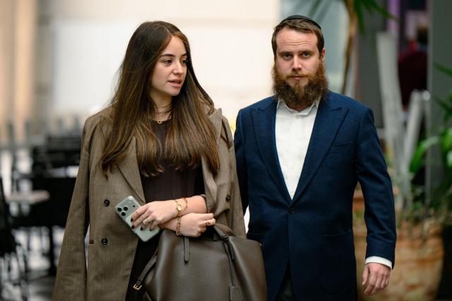 Sheina Gutnick (L), whose father was killed in a mass shooting at Bondi Beach, arrives for the first hearing block of the Royal Commission on Antisemitism and Social Cohesion in Sydney on May 4, 2026. An Australian inquiry opened public hearings on May 4 into an antisemitic shooting that killed 15 people at a Jewish festival on Sydney's Bondi Beach. (Photo by GEORGE CHAN / AFP)