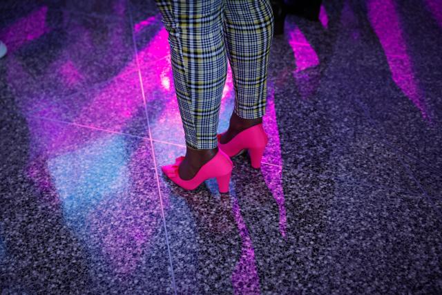 People attend "The People's Ball" at Brooklyn Public Library's Central Branch in Brooklyn, New York on May 3, 2026. "The People's Ball" offers an alternative to the Met Gala, allowing people to express their person styles. (Photo by kena betancur / AFP)