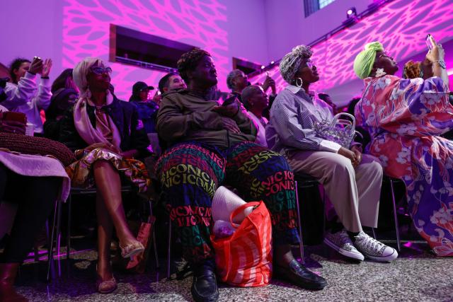People attend "The People's Ball" at Brooklyn Public Library's Central Branch in Brooklyn, New York on May 3, 2026. "The People's Ball" offers an alternative to the Met Gala, allowing people to express their person styles. (Photo by kena betancur / AFP)