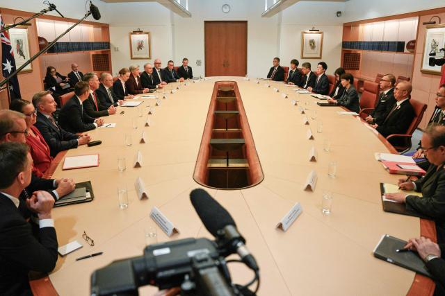 Australia's Prime Minister Anthony Albanese (7th L) and Japan's Prime Minister Sanae Takaichi (5th R) attend the Australia–Japan Annual Leaders’ Meeting at Parliament House in Canberra on May 4, 2026. (Photo by Saeed KHAN / AFP)