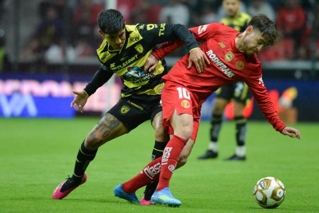 Pachuca's midfielder #08 Victor Guzman and Toluca's midfielder #10 Jesus Angulo fight for the ball during the Mexican League Clausura Tournament quarterfinal first leg football match between Toluca and Pachuca at the Nemesio Diaz stadium in Toluca, Mexico, on May 3, 2026. (Photo by Mario Vazquez / AFP)