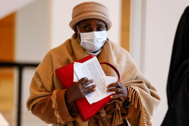 (FILES) Agathe Habyarimana, the widow of Rwandan President whose killing sparked the 1994 genocide arrives at the courthouse in Paris, on November 3, 2020 to be heard in the investigation on the part played by former French gendarme Paul Barril during the genocide in Rwanda. The French court is set to rule on decision to dismiss the Rwandan Tutsi genocide case against Agathe Habyarimana, at the Paris courthouse on May 6, 2026. (Photo by Thomas SAMSON / AFP)