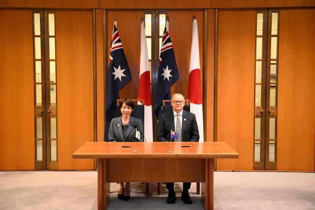 Japan's Prime Minister Sanae Takaichi (L) and Australia's Prime Minister Anthony Albanese are seated before taking part in a signing ceremony for a joint declaration of economic security cooperation at Parliament House in Canberra on May 4, 2026. (Photo by Saeed KHAN / AFP)