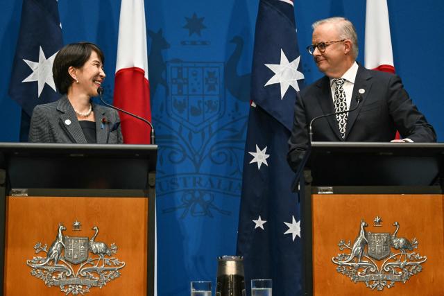 Australia's Prime Minister Anthony Albanese (R) and Japan's Prime Minister Sanae Takaichi speak to the press at Parliament House in Canberra on May 4, 2026. (Photo by Saeed Khan / AFP)