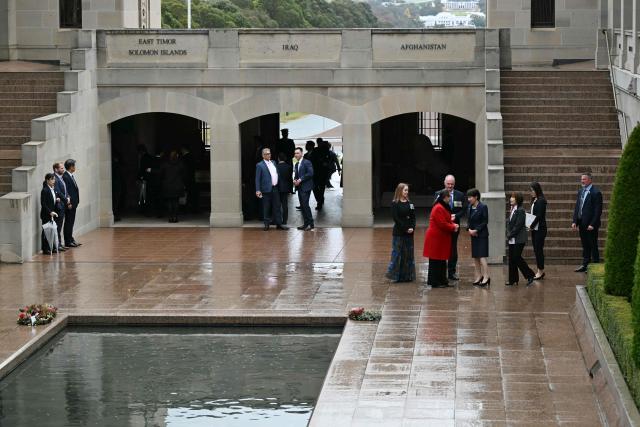 Japan's Prime Minister Sanae Takaichi (C, at right) is welcomed during her visit to the Australian War Memorial in Canberra on May 4, 2026. (Photo by Saeed Khan / AFP)