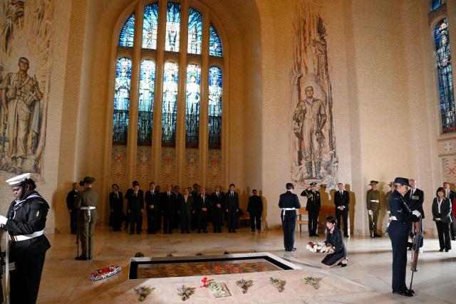 Japan's Prime Minister Sanae Takaichi lays a wreath at the Tomb of the Unknown Soldier during her visit to the Australian War Memorial in Canberra on May 4, 2026. (Photo by Saeed KHAN / AFP)