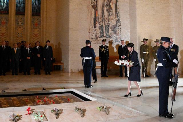 Japan's Prime Minister Sanae Takaichi lays a wreath at the Tomb of the Unknown Soldier during her visit to the Australian War Memorial in Canberra on May 4, 2026. (Photo by Saeed KHAN / AFP)