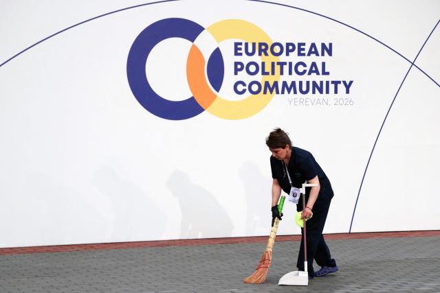 Cleaners prepare the arrival zone ahead of the 8th European Political Community (EPC) summit in Yerevan on May 4, 2026. (Photo by Ludovic MARIN / AFP)